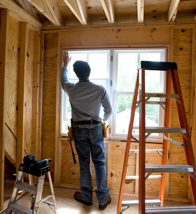 worker-checking-the-window